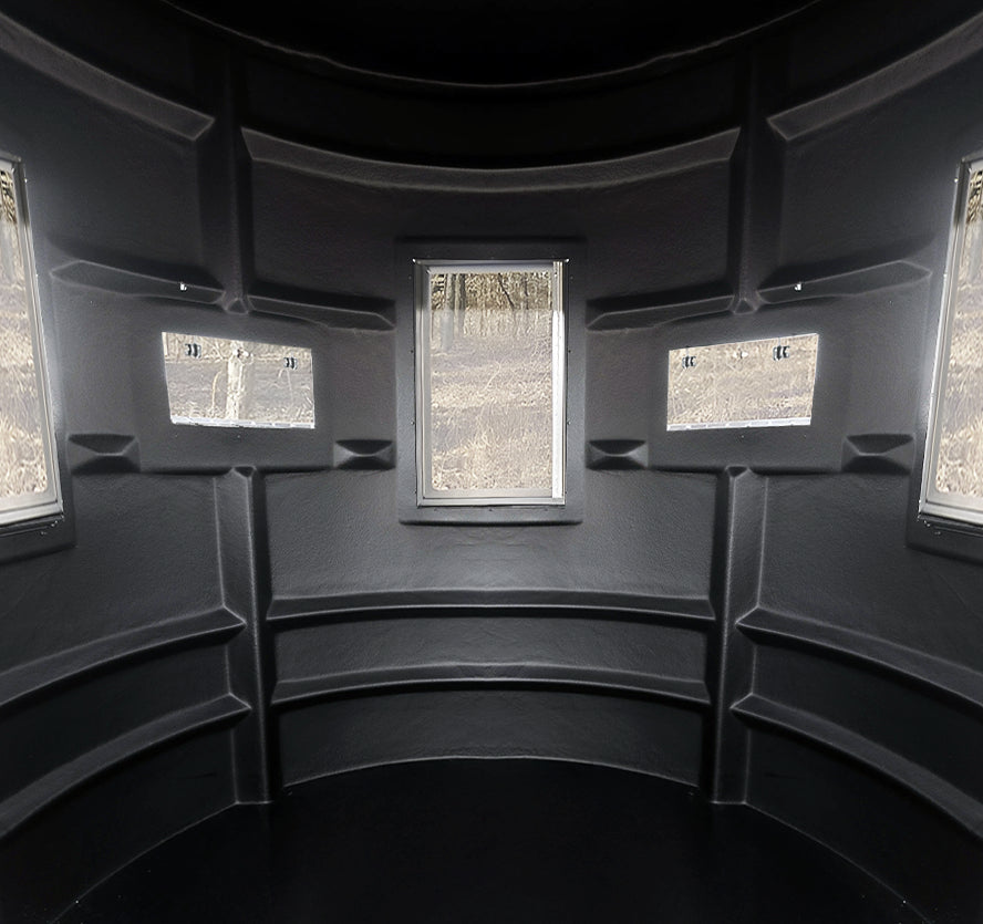 Interior of the Sportsman’s Condo Bow Condo deer blind with multiple bow-friendly windows