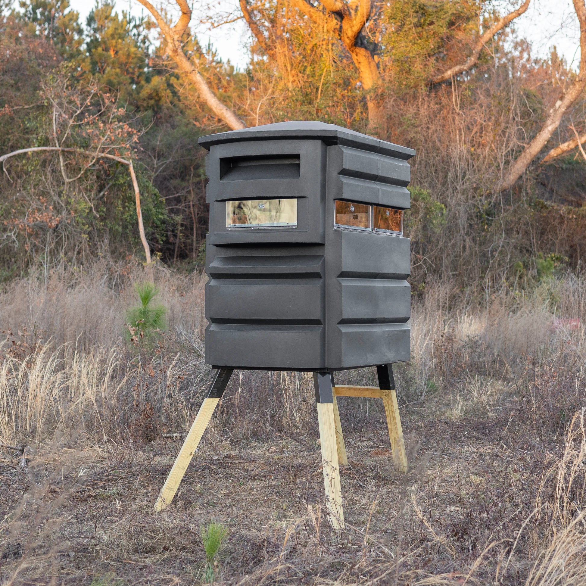 Sportsman’s Condo SC2 4x6 deer hunting blind in a grassy field, angled view (image 06)