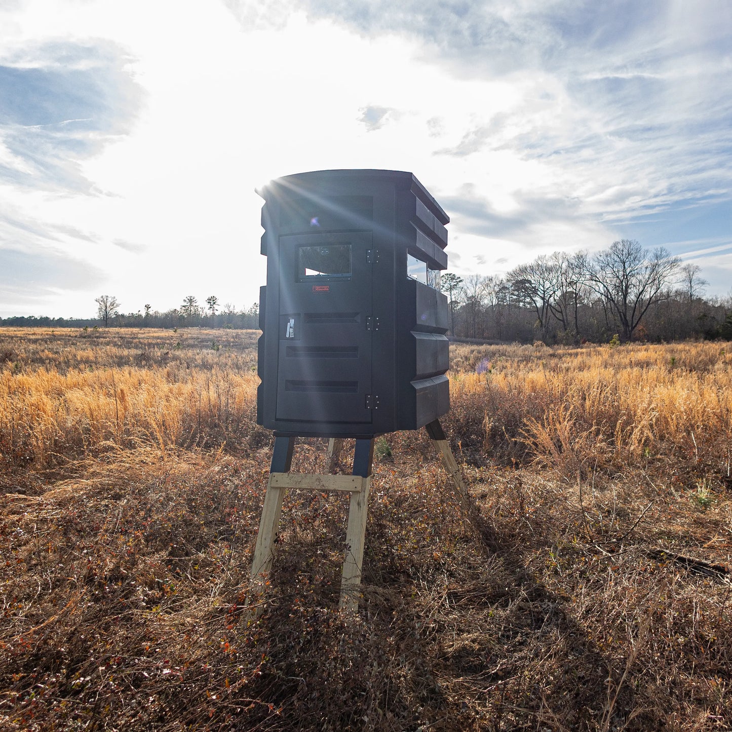 Sportsman’s Condo SC2 4x6 deer blind elevated among tall grass, side angle (image 13)