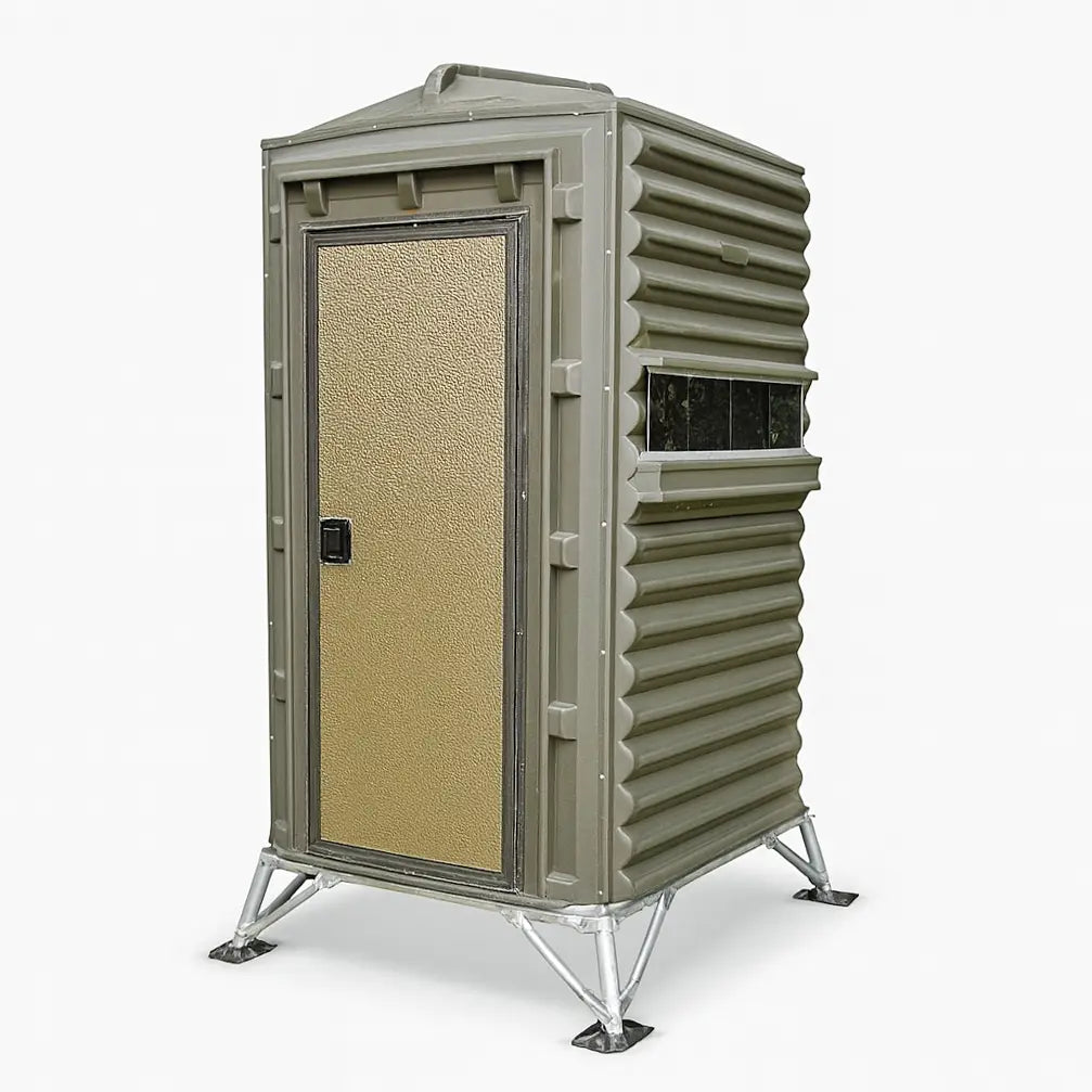 Angled profile of The Blynd 4x4 Deer Hunting Blind isolated on white background, showing full-height entry door and textured exterior.

