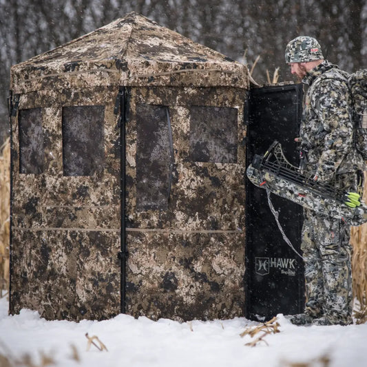 Hawk Scout ground hunting blind set up in natural environment, camo exterior for deer hunting