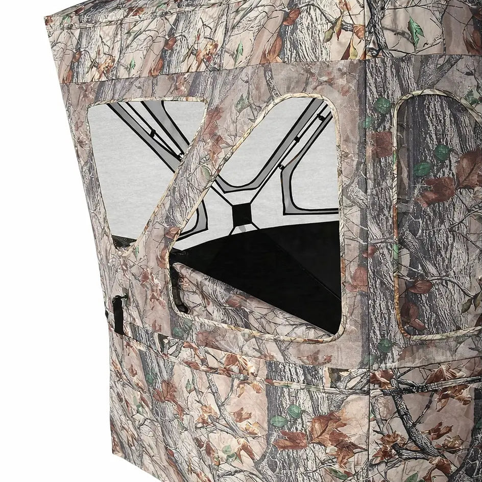 Muddy Epic Camo Infinity ground hunting blind window detail with triangular shooting opening