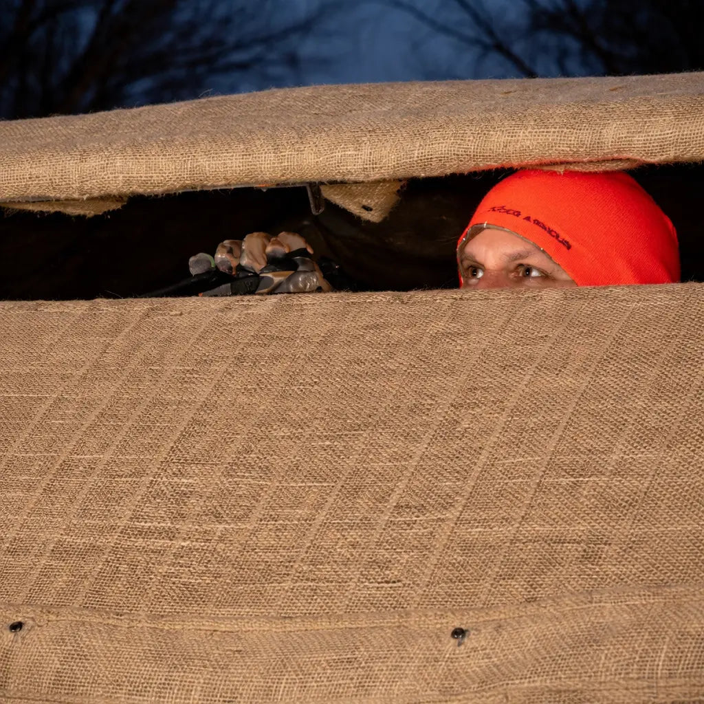 Muddy Bale Blind interior window view looking out toward field