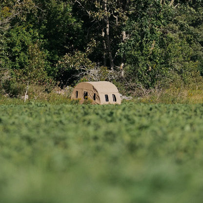 Muddy Bale Blind exterior product view with curved hay bale design