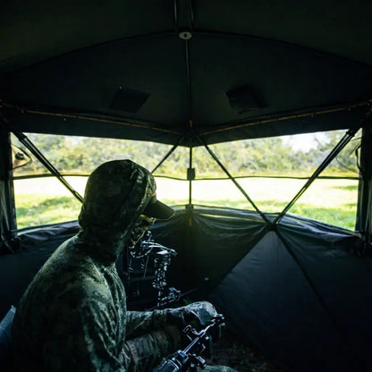Interior view from inside Muddy Infinity 2-Man ground hunting blind at sunrise