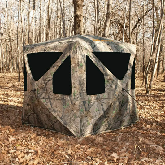 Muddy Ravage ground hunting blind exterior in wooded terrain