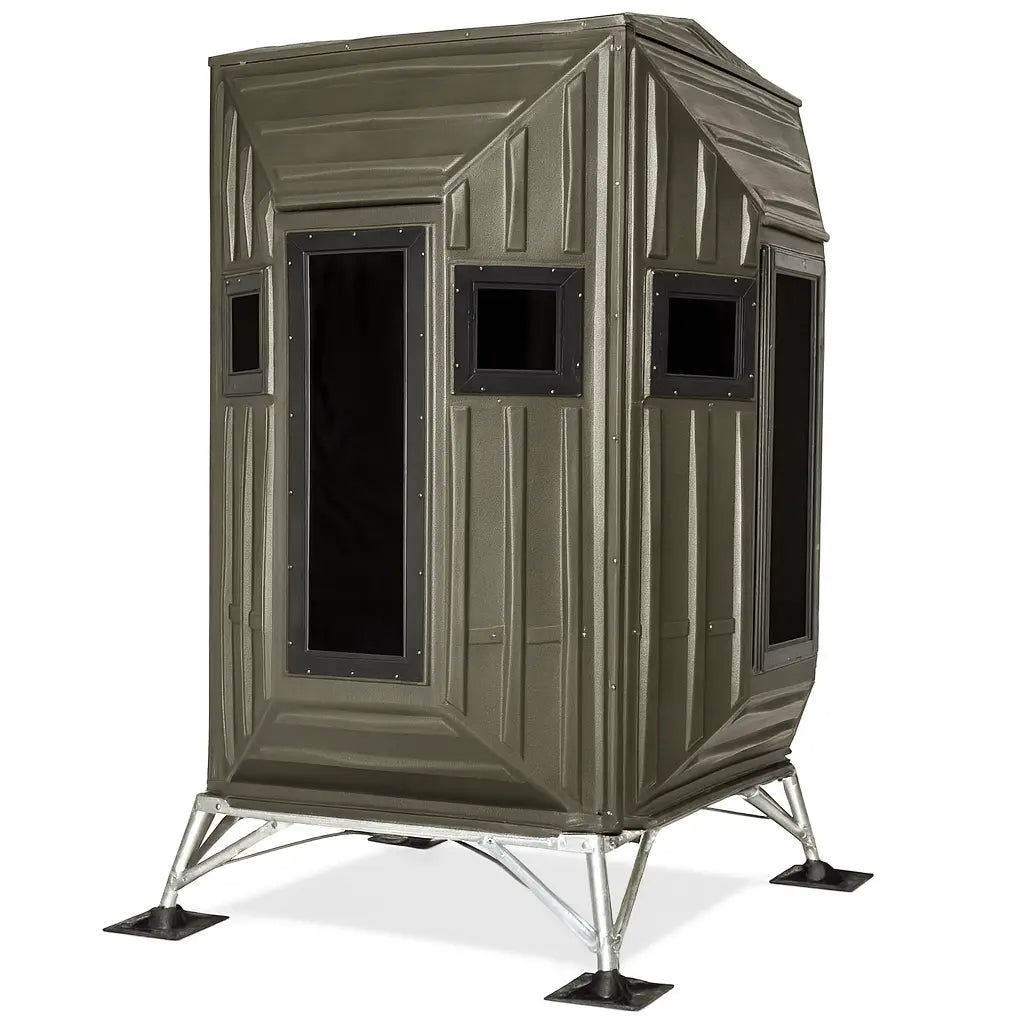 Side view of The Blynd 4x4 Bow Hunting Deer Blind on a white background, featuring textured panels and shooting window.