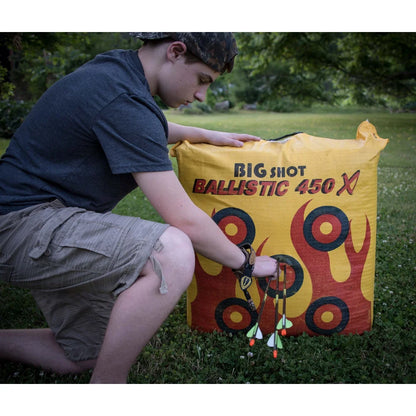 Big Shot Ballistic 450X bag archery target in use outdoors, young archer pulling arrows from target face