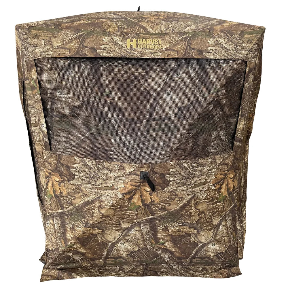 HARVST Outdoors Bow Hunter DM Ground Blind in Realtree Legacy, front view with mesh window and Harvst Outdoors logo