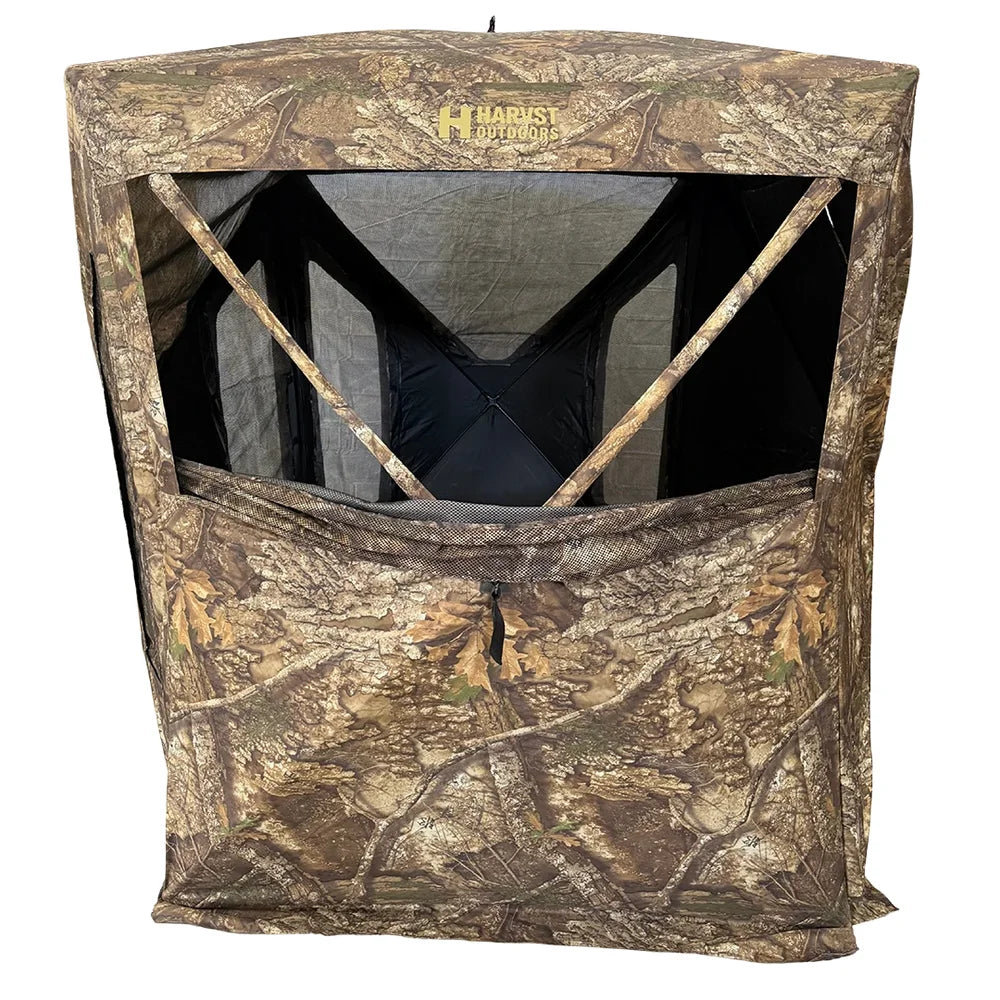 HARVST Outdoors Bow Hunter DM Ground Blind in Realtree Legacy with front window rolled open showing black interior
