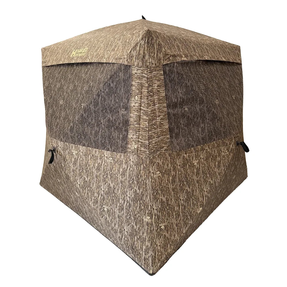 HARVST Outdoors BroadBase DM Ground Blind in Mossy Oak Bottomland, front three-quarter view with windows closed