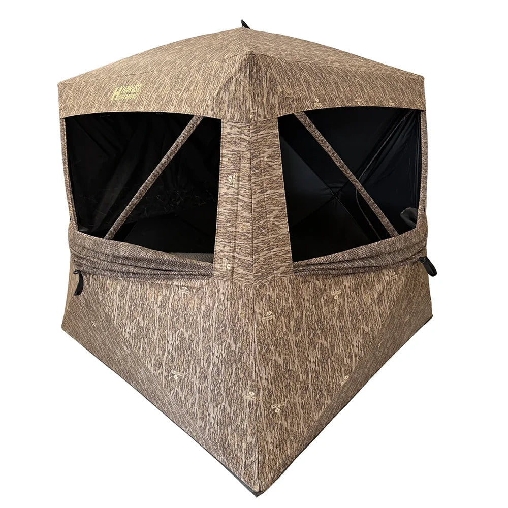 HARVST Outdoors BroadBase DM Ground Blind in Mossy Oak Bottomland, front view with shoot-through mesh windows open