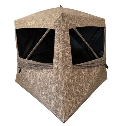 HARVST Outdoors BroadBase DM Ground Blind in Mossy Oak Bottomland, front view with shoot-through mesh windows open