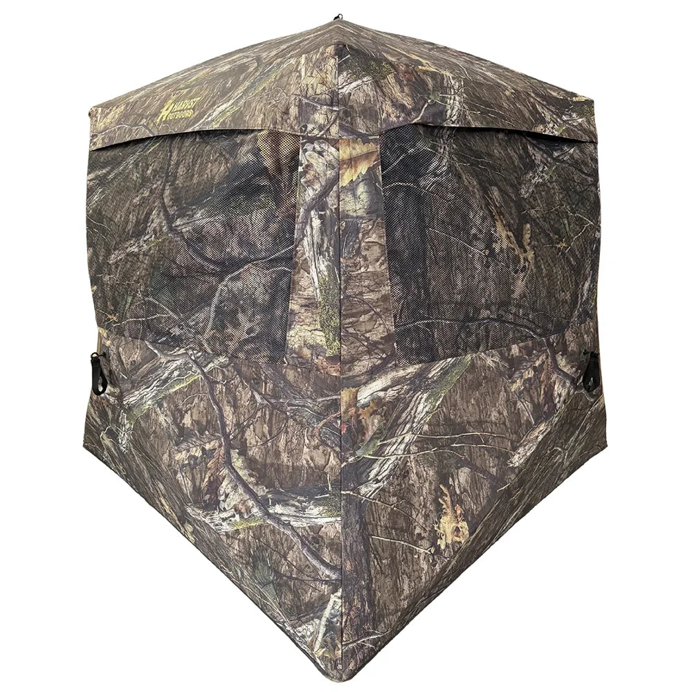 HARVST Outdoors BroadBase DM Ground Blind front view with mesh windows in Mossy Oak Country DNA camo