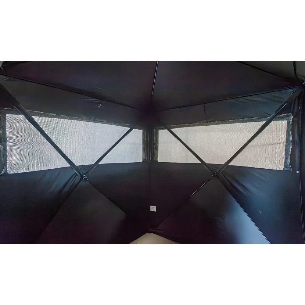 HARVST Outdoors Brushline DM Ground Blind interior view showing black shadow lining and mesh windows