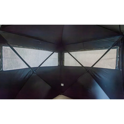 HARVST Outdoors Brushline DM Ground Blind interior view showing black shadow lining and mesh windows