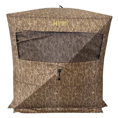 HARVST Outdoors Brushline DM Ground Blind in Mossy Oak Country DNA, front view with mesh window and zippered door