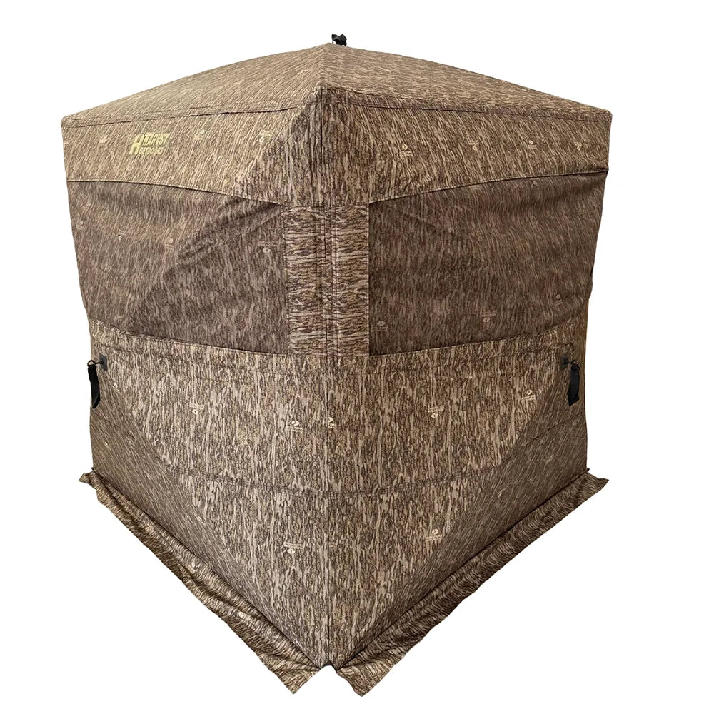 HARVST Outdoors Brushline STM Ground Blind in Bottomland camo, front three-quarter view with windows closed