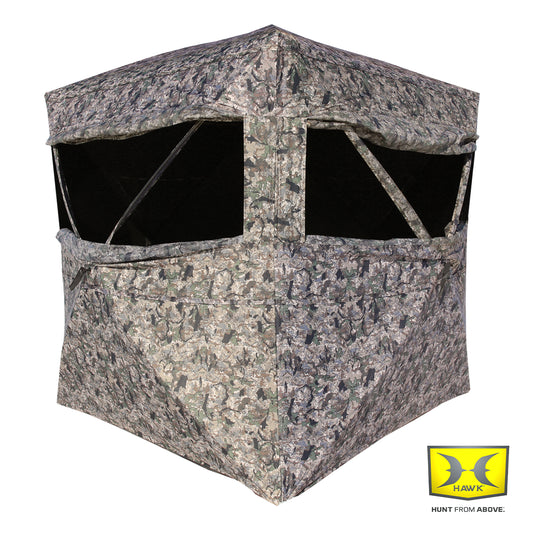 Hawk Reveal ground hunting blind product view showing camo exterior and hub-style design