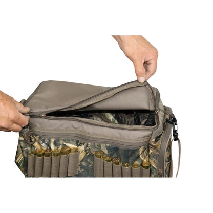 Landing Gear Deluxe Blind Bag top zippered pocket being opened by hands, showing shotgun shell holders below