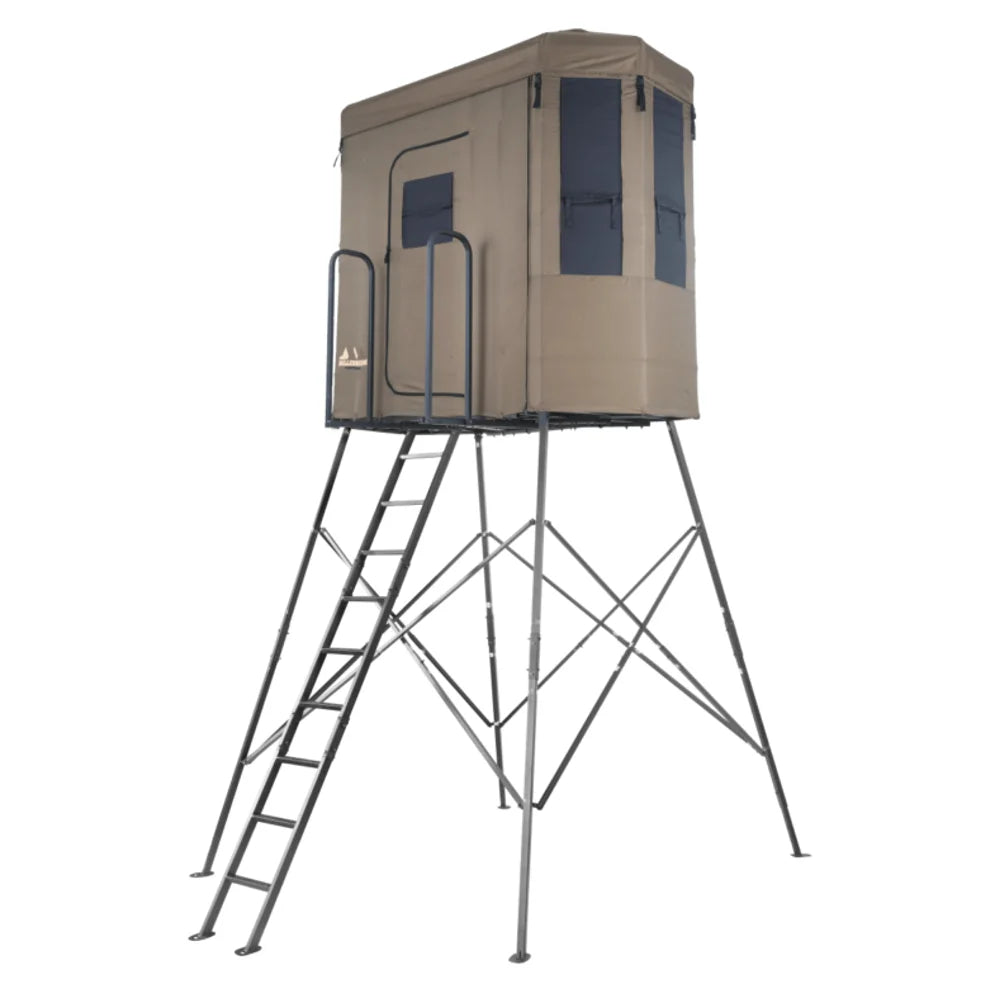 Millennium Treestands Q200 Buck Hut Shooting House, front three-quarter view showing tan fabric blind on elevated steel to…