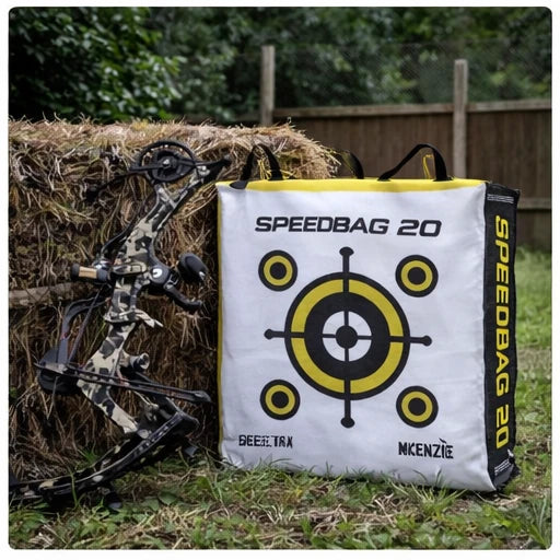 Delta McKenzie Speedbag 20 archery bag target with compound bow in backyard range