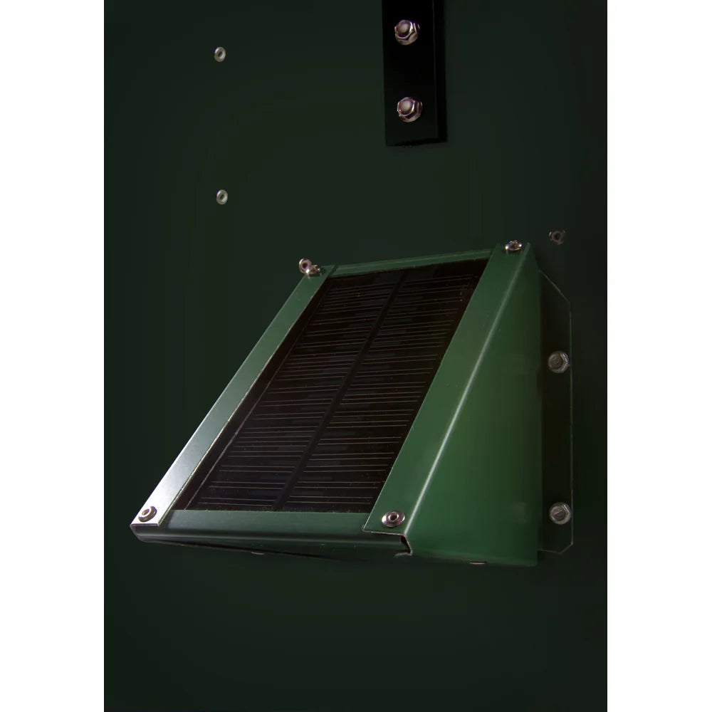 Sweeney 100 lb Scatter Feeder green, close-up detail of solar panel mounted on the green feeder body