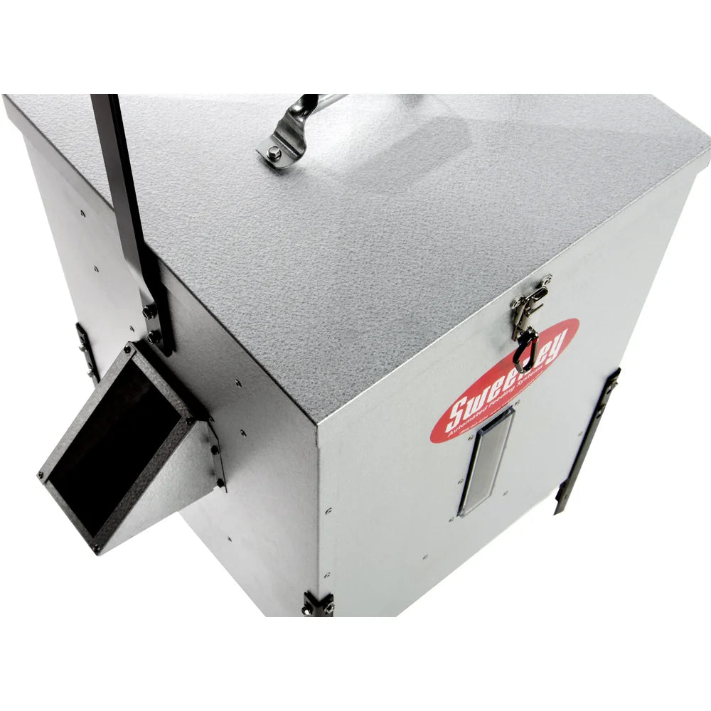 Sweeney 100 lb Scatter Feeder silver, overhead angled close-up showing lid latch, carry handle, and feed trough