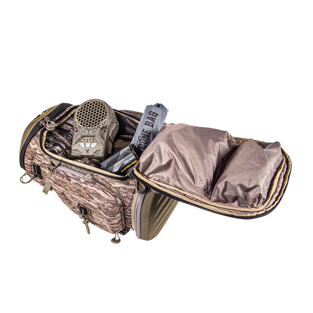 Tenzing Hangtime Day Pack open showing main compartment loaded with hunting gear and bone bag