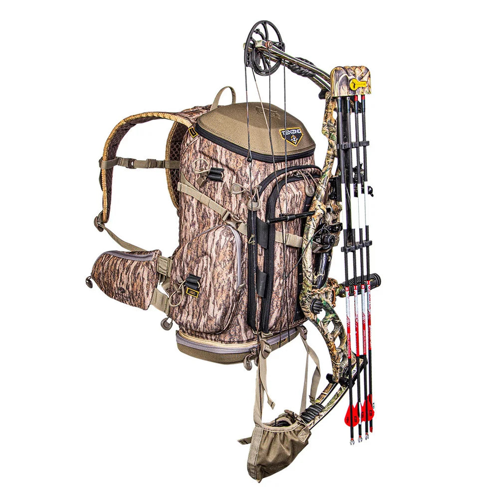 Tenzing Hangtime Day Pack side view in Bottomland camo with compound bow and arrows attached