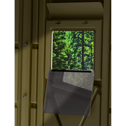 Terrain Archer Bow Blind tinted flip-down window with forest view through opening