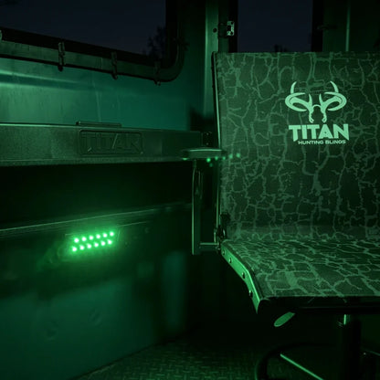 Titan 12V Light Kit LEDs illuminating Titan blind interior and camo chair at night