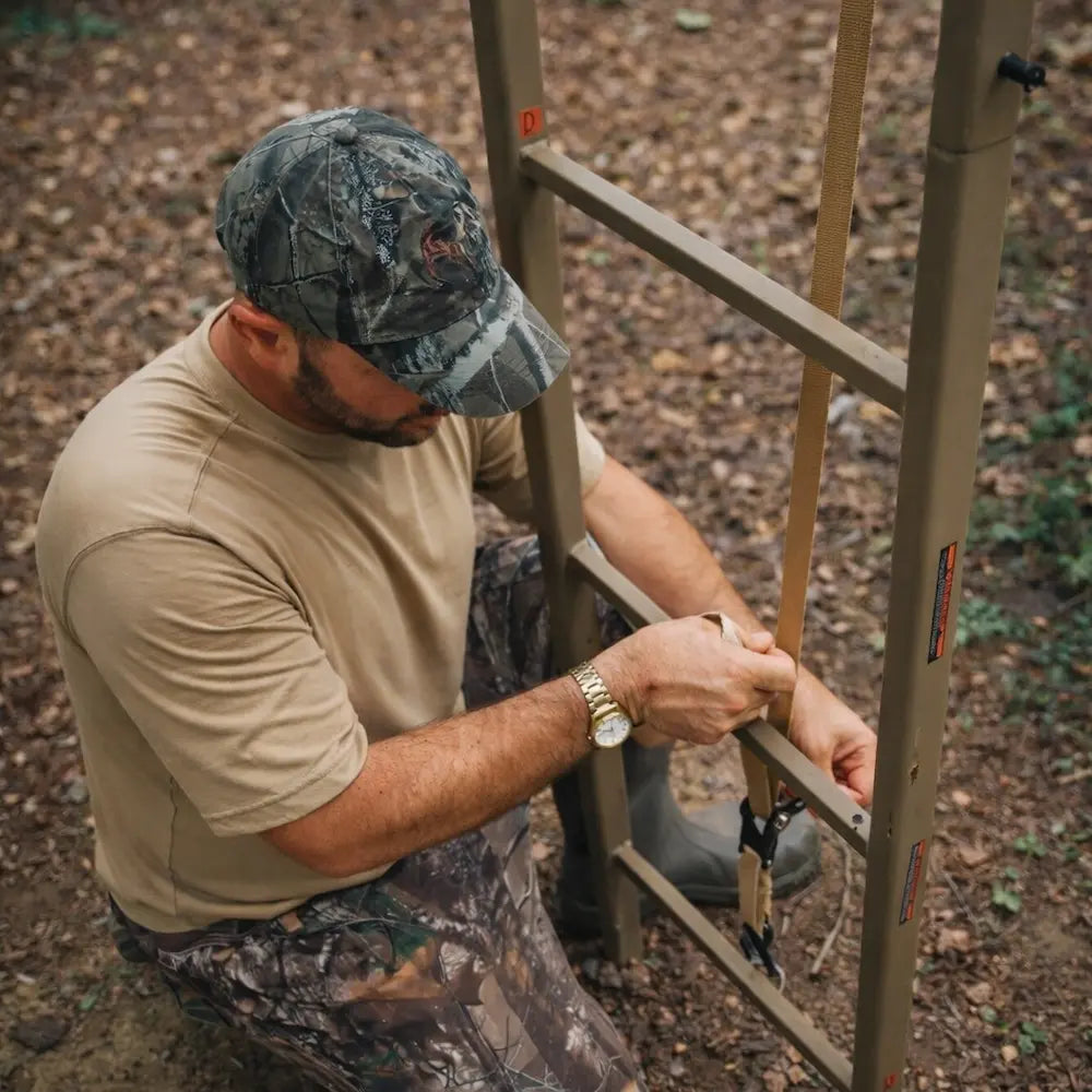 Trophy Treestands Mountaineer 20' Ladderstand attaching the safety strap